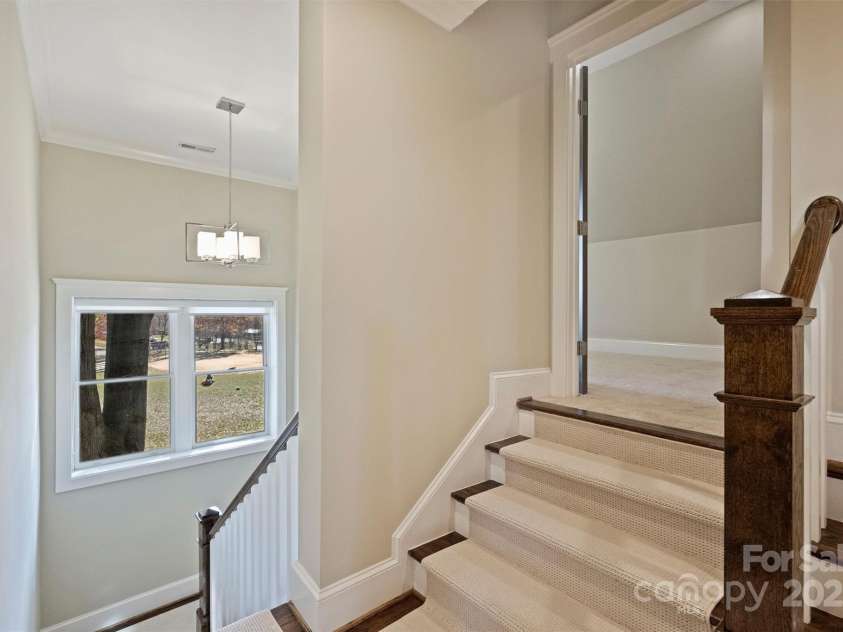 3304 Josephine Court, Charlotte, NC 28205.  MLS# CAR4319912, YatesRealty ID 48912. Stairs to Rec. Room.