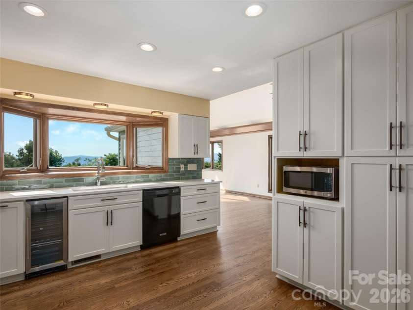 288 Roberts Drive, Laurel Park, NC 28739.  MLS# CAR4420800, YatesRealty ID 48914. Bright kitchen with generous workspace