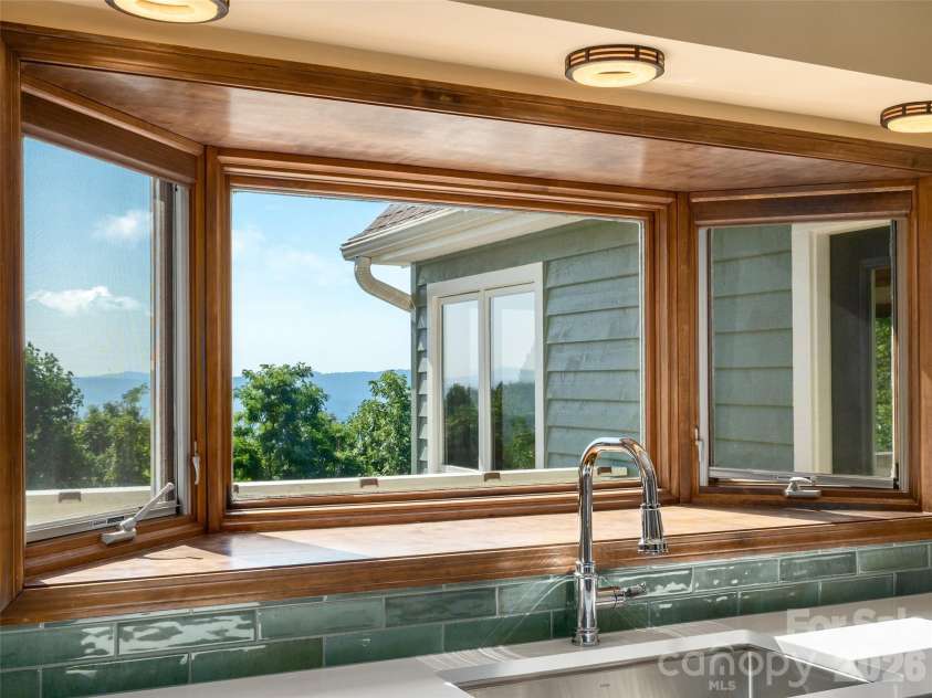 288 Roberts Drive, Laurel Park, NC 28739.  MLS# CAR4420800, YatesRealty ID 48914. Kitchen bay window with lovely mountain views
