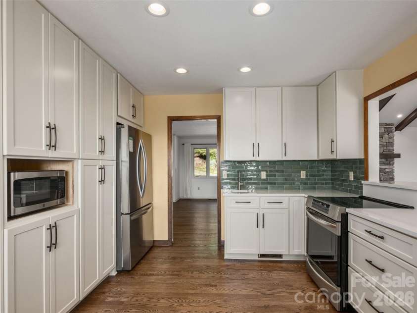 288 Roberts Drive, Laurel Park, NC 28739.  MLS# CAR4420800, YatesRealty ID 48914. Kitchen that was remodeled in 2025