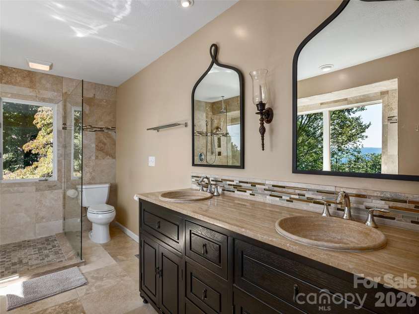 288 Roberts Drive, Laurel Park, NC 28739.  MLS# CAR4420800, YatesRealty ID 48914. Large Primary vanity with updated finishes