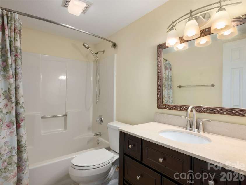 288 Roberts Drive, Laurel Park, NC 28739.  MLS# CAR4420800, YatesRealty ID 48914. Lower level bath