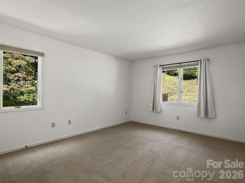 288 Roberts Drive, Laurel Park, NC 28739.  MLS# CAR4420800, YatesRealty ID 48914. Third main level bedroom