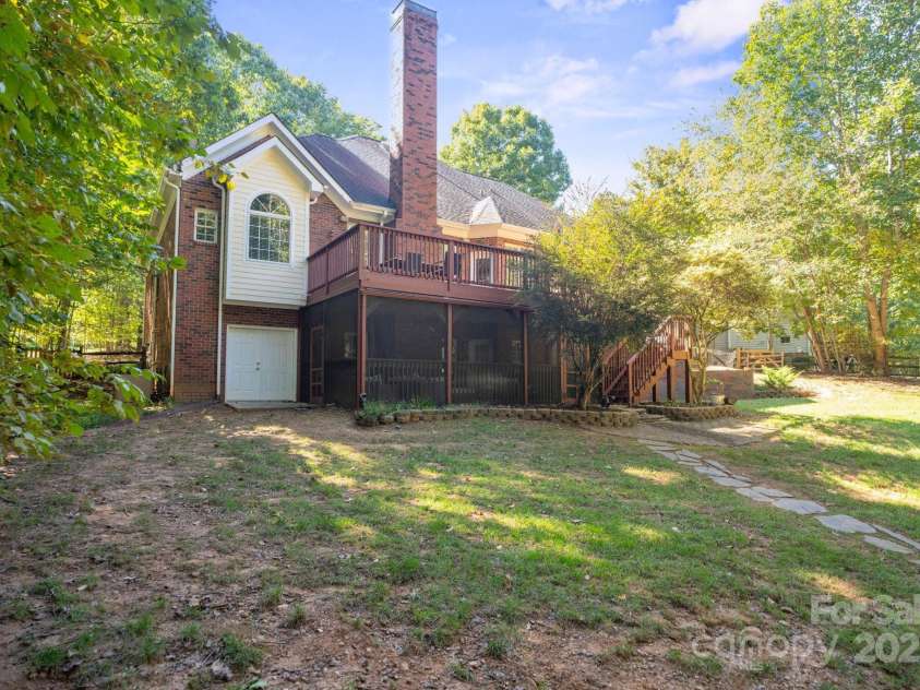 128 Archbell Point Lane, Mooresville, NC 28117.  MLS# CAR4192948, YatesRealty ID 4892. Backyard view