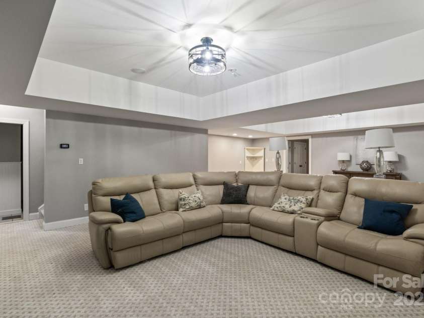 128 Archbell Point Lane, Mooresville, NC 28117.  MLS# CAR4192948, YatesRealty ID 4892. Basement Living Room