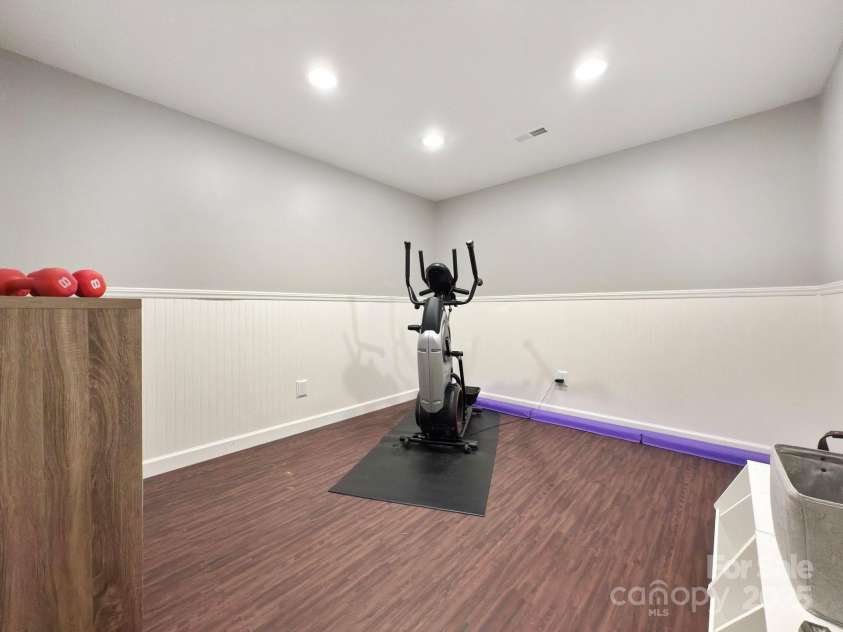 128 Archbell Point Lane, Mooresville, NC 28117.  MLS# CAR4192948, YatesRealty ID 4892. Basement Workout Room