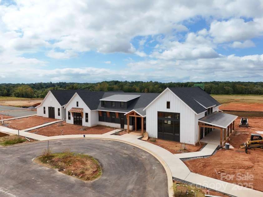 2215 Whitebark Drive, Indian Land, SC 29707.  MLS# CAR4322633, YatesRealty ID 48920. Clubhouse completion on track for Summer 2026