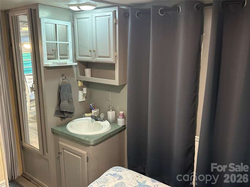 138 Marina Drive, New London, NC 28127.  MLS# CAR4398855, YatesRealty ID 48921. 