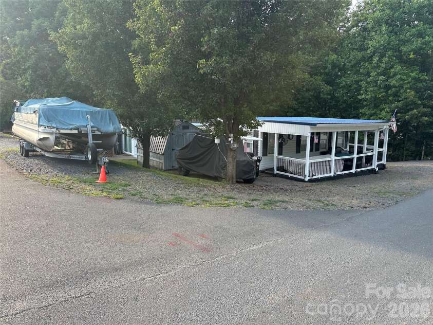 138 Marina Drive, New London, NC 28127.  MLS# CAR4398855, YatesRealty ID 48921. 