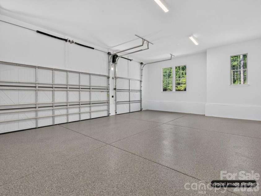128 Willow View Loop, Davidson, NC 28036.  MLS# CAR4403823, YatesRealty ID 48929. 3 Car Sideload Garage
