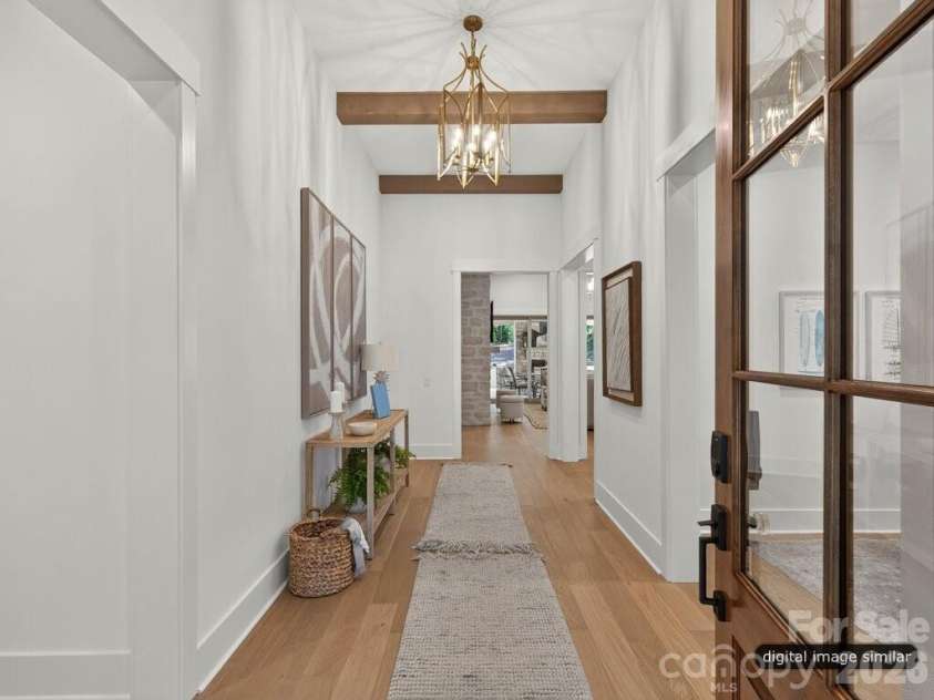 128 Willow View Loop, Davidson, NC 28036.  MLS# CAR4403823, YatesRealty ID 48929. Entry Foyer Beams