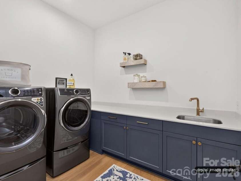 128 Willow View Loop, Davidson, NC 28036.  MLS# CAR4403823, YatesRealty ID 48929. Laundry Room