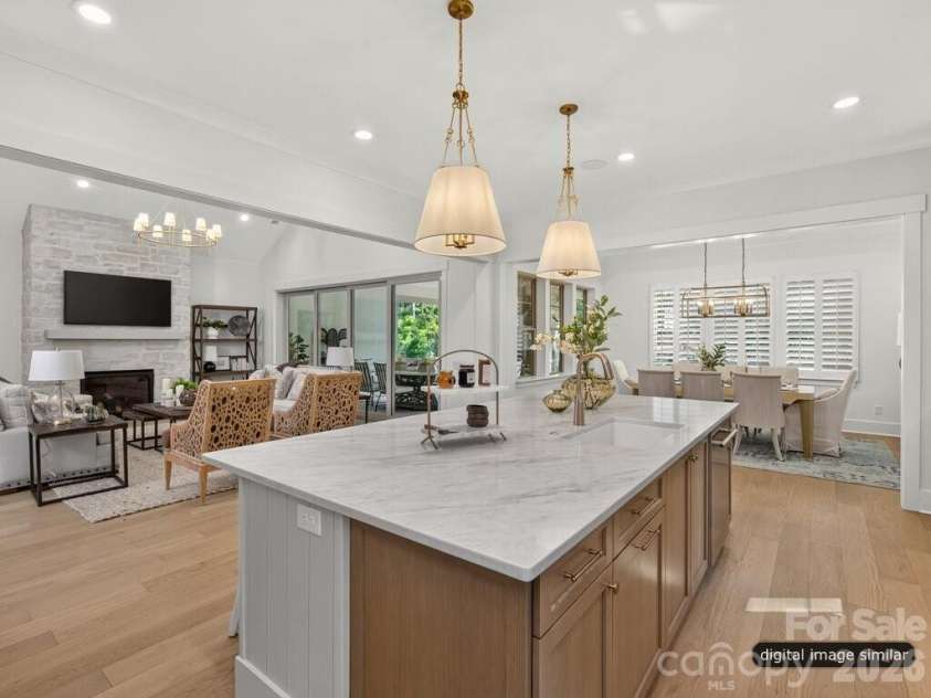 128 Willow View Loop, Davidson, NC 28036.  MLS# CAR4403823, YatesRealty ID 48929. Open Floorplan from Kitchen to Living Room