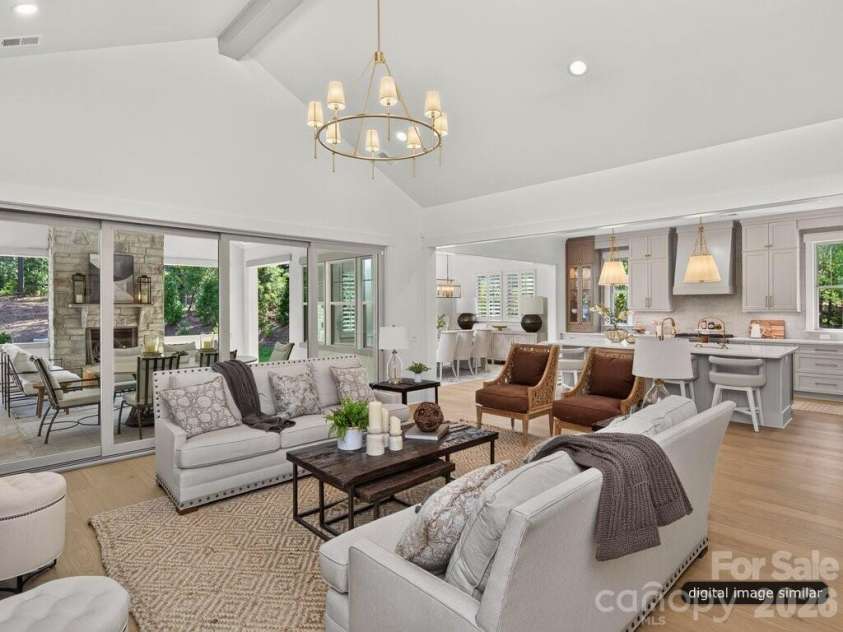128 Willow View Loop, Davidson, NC 28036.  MLS# CAR4403823, YatesRealty ID 48929. Open Floorplan that flows into Kitchen,  Dining Room, & Covered Outdoor Terrace