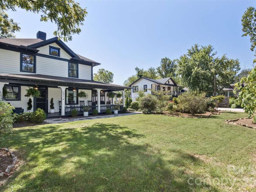 293 Fairview Road, Asheville, NC 28803.  MLS# CAR4421147, YatesRealty ID 48935. Front yard with landscaping