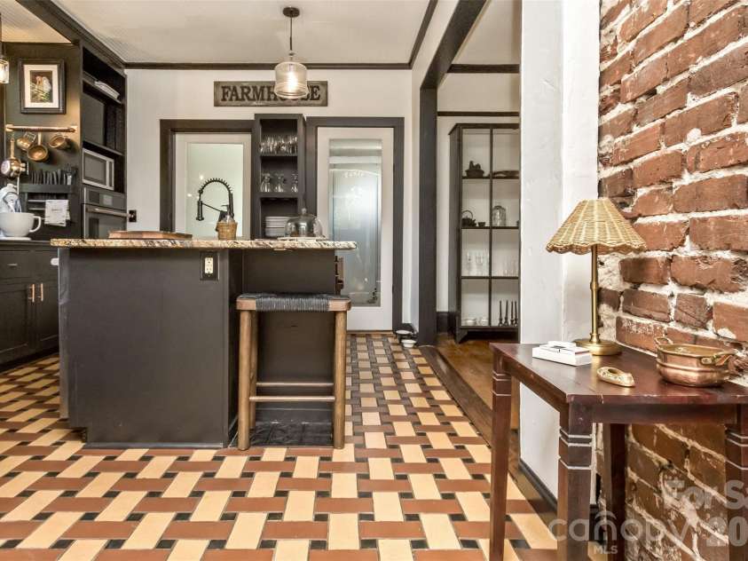 293 Fairview Road, Asheville, NC 28803.  MLS# CAR4421147, YatesRealty ID 48935. Kitchen looking from front foyer