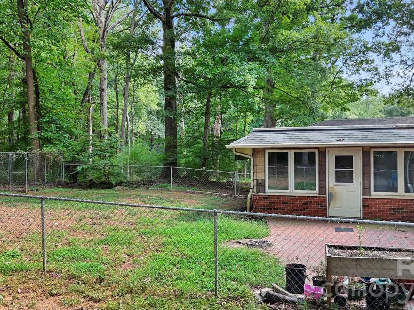 386 Broad Street, Denton, NC 27239.  MLS# CAR4421830, YatesRealty ID 48940. Back patio