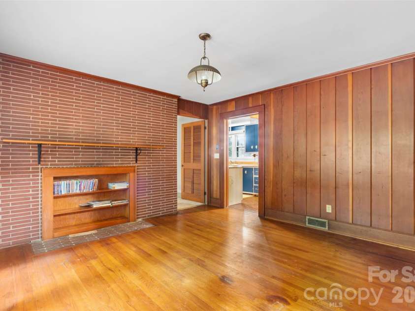 386 Broad Street, Denton, NC 27239.  MLS# CAR4421830, YatesRealty ID 48940. Paneled Den w/fireplace