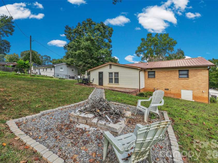 2435 Lewiston Drive, Gastonia, NC 28054.  MLS# CAR4420710, YatesRealty ID 48943. Firepit