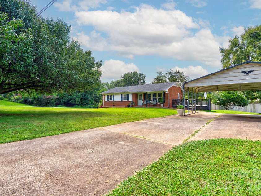 109 Delmar Road, Shelby, NC 28152.  MLS# CAR4421602, YatesRealty ID 48947. Front Right Detached Double Carport