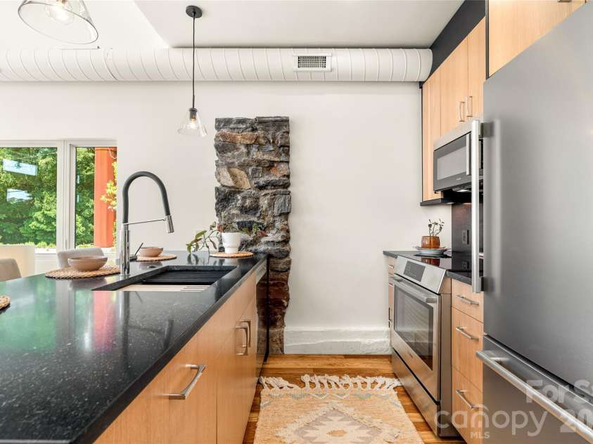4 Roberts Street, Asheville, NC 28801.  MLS# CAR4419895, YatesRealty ID 48950. Kitchen has everything you need!