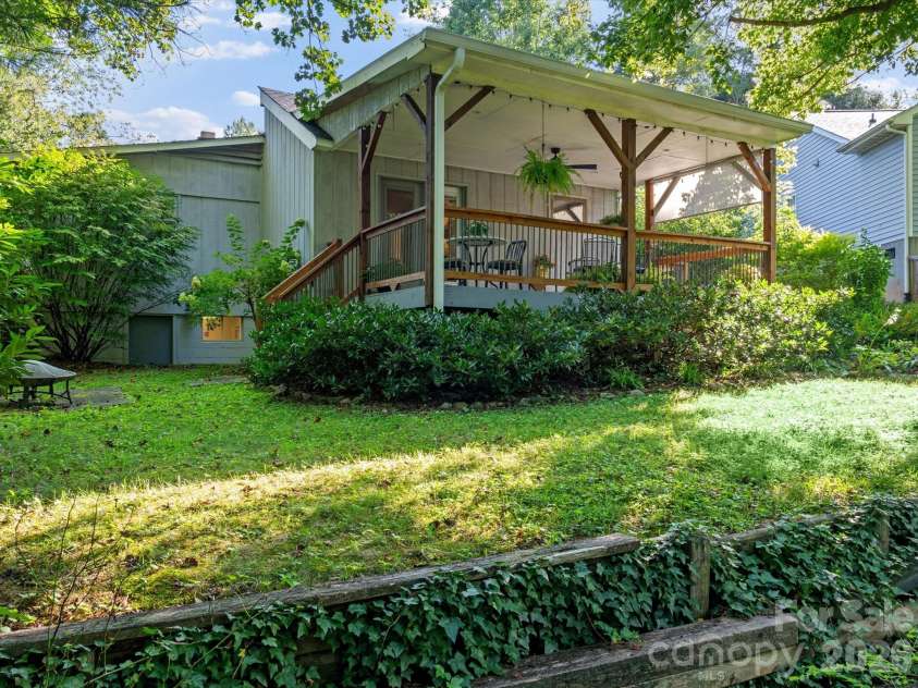 110 Aurora Drive, Asheville, NC 28805.  MLS# CAR4418435, YatesRealty ID 48958. Access to the backyard from the back deck