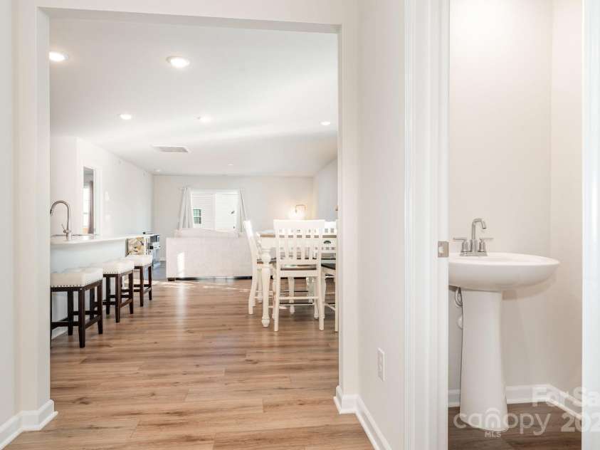 150 Mountain Bridge Way, Statesville, NC 28625.  MLS# CAR4330213, YatesRealty ID 4896. Foyer entrance showing powder room on the main level and open floor plan