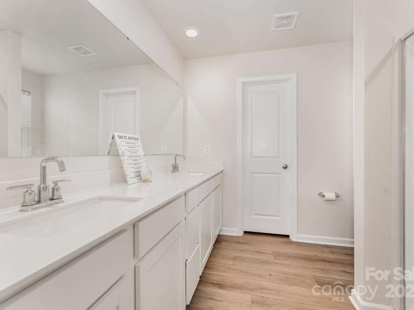 150 Mountain Bridge Way, Statesville, NC 28625.  MLS# CAR4330213, YatesRealty ID 4896. Full bathroom with double vanities and walk-in in shower