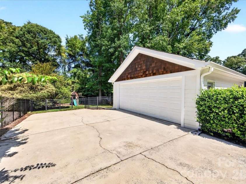 6138 Saint John Lane, Charlotte, NC 28210.  MLS# CAR4420688, YatesRealty ID 48964. Detached 2 car Garage with pull down attic for storage