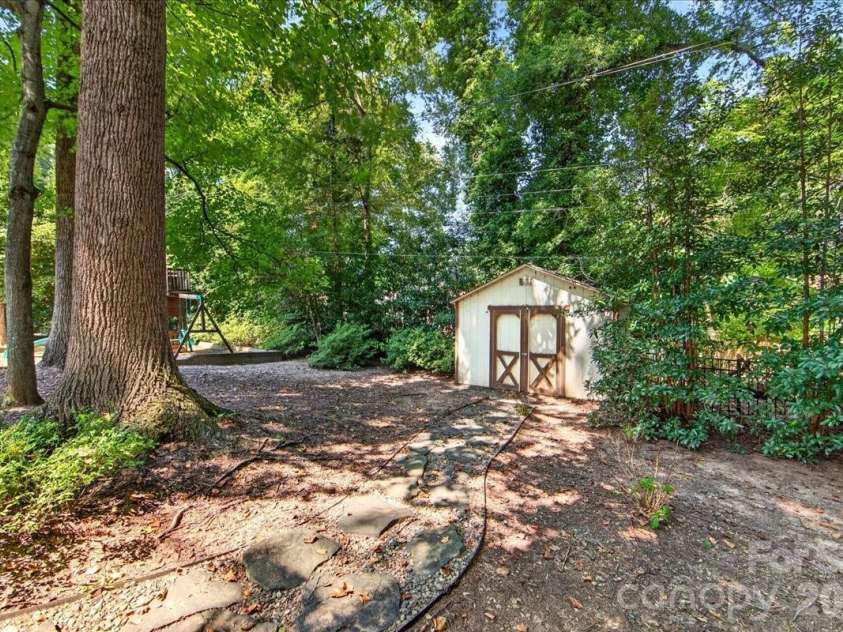 6138 Saint John Lane, Charlotte, NC 28210.  MLS# CAR4420688, YatesRealty ID 48964. Shed for extra storage