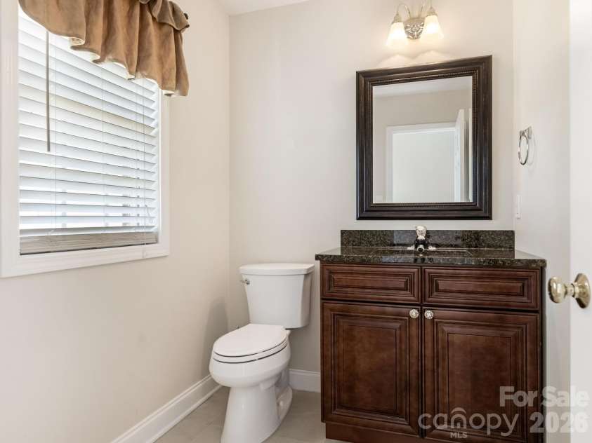 7000 Hemby Commons Parkway, Indian Trail, NC 28079.  MLS# CAR4421495, YatesRealty ID 48971. Half bath off the Foyer
