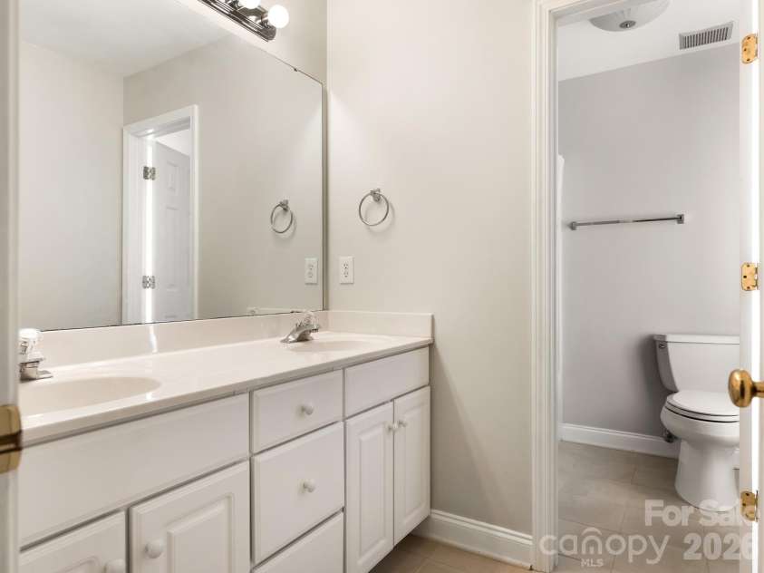 7000 Hemby Commons Parkway, Indian Trail, NC 28079.  MLS# CAR4421495, YatesRealty ID 48971. Upstairs bath with duel vanity