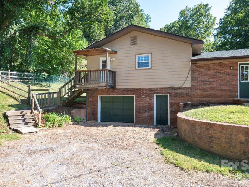 2 Independence Boulevard, Asheville, NC 28805.  MLS# CAR4419918, YatesRealty ID 48988. Driveway goes around back for