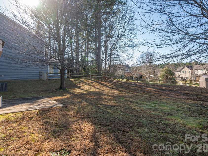 104 Barley Court, Mount Holly, NC 28120.  MLS# CAR4334232, YatesRealty ID 4899. Large backyard!