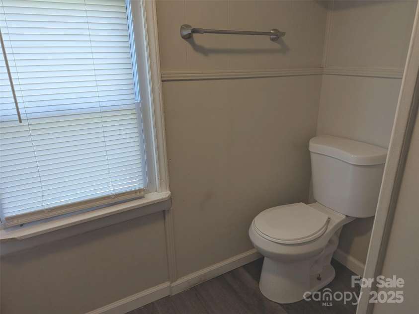 3703 Crawford Street, Gastonia, NC 28052.  MLS# CAR4237431, YatesRealty ID 4900. Bath toilet