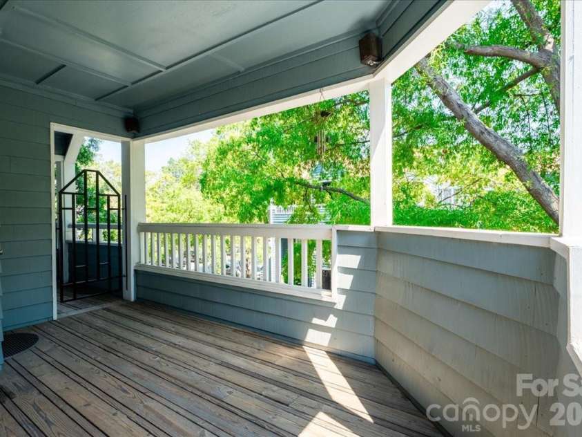 419 8th Street, Charlotte, NC 28202.  MLS# CAR4421707, YatesRealty ID 49009. Your private balcony with a gate & storage closet