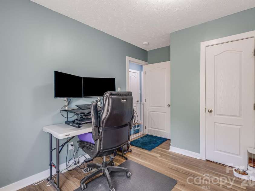 582 John Henry Road, Burnsville, NC 28714.  MLS# CAR4421454, YatesRealty ID 49014. Flexible third bedroom or office