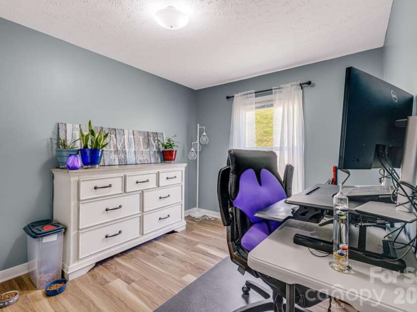 582 John Henry Road, Burnsville, NC 28714.  MLS# CAR4421454, YatesRealty ID 49014. Third bedroom currently used as office