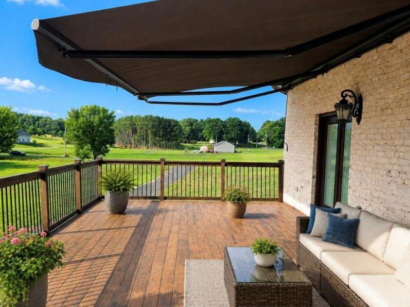 3233 Hahn Scott Road, Mount Pleasant, NC 28124.  MLS# CAR4421971, YatesRealty ID 49027. Veranda on Main Floor with custom Trexler composite Decking!
