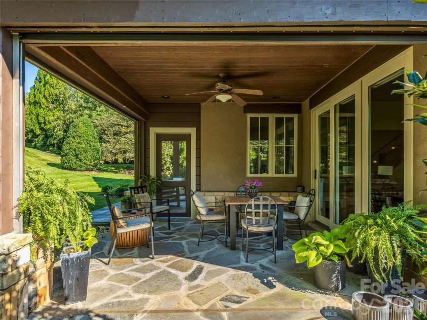583 Walnut Valley Parkway, Arden, NC 28704.  MLS# CAR4413948, YatesRealty ID 49036. Screened in outdoor area