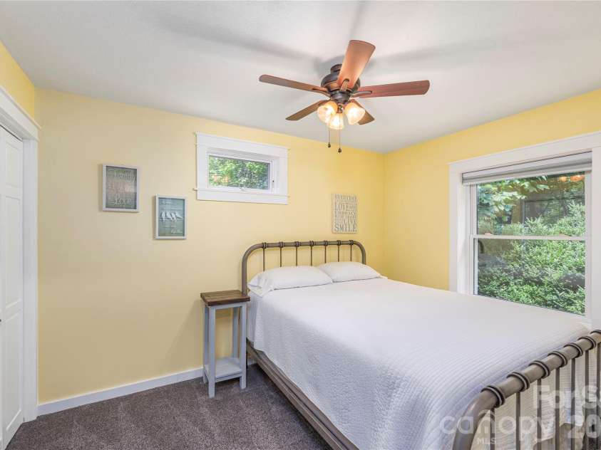 477 Locust Drive, Maggie Valley, NC 28751.  MLS# CAR4420658, YatesRealty ID 49040. Guest bedroom downstairs