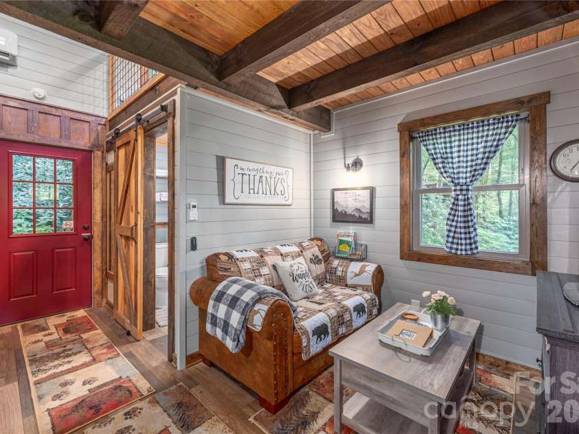477 Locust Drive, Maggie Valley, NC 28751.  MLS# CAR4420658, YatesRealty ID 49040. Guest cabin