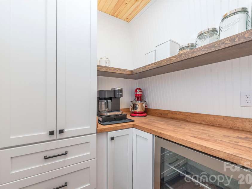 477 Locust Drive, Maggie Valley, NC 28751.  MLS# CAR4420658, YatesRealty ID 49040. Pantry