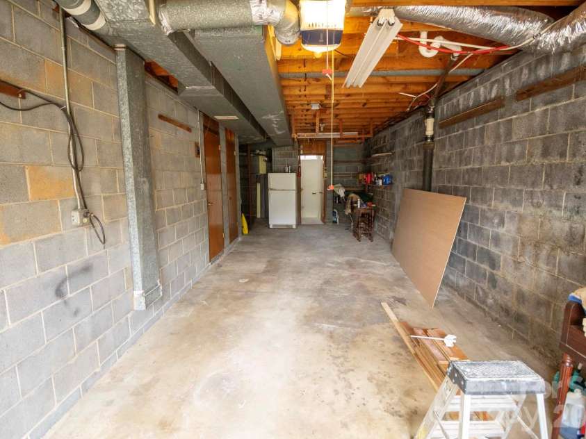 317 Brickyard Road, Asheville, NC 28806.  MLS# CAR4414961, YatesRealty ID 49047. Single Garage