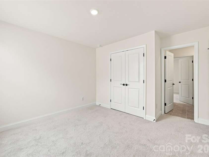 4022 Puddle Pond Road, Indian Trail, NC 28079.  MLS# CAR4421987, YatesRealty ID 49049. Secondary Bedroom- photo for representational purposes