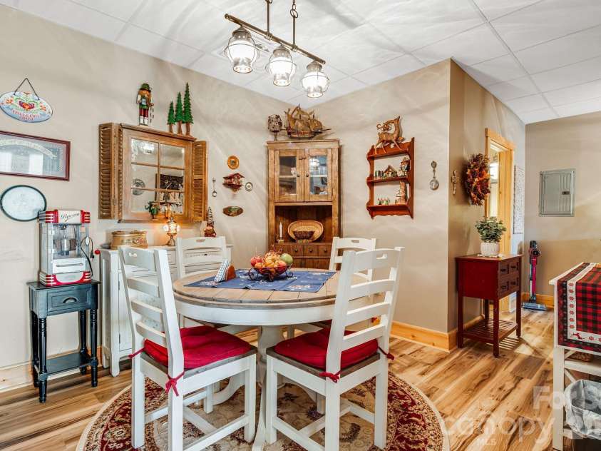 158 Raven Boulevard, Lake Lure, NC 28746.  MLS# CAR4335082, YatesRealty ID 4906. Downstairs eating area