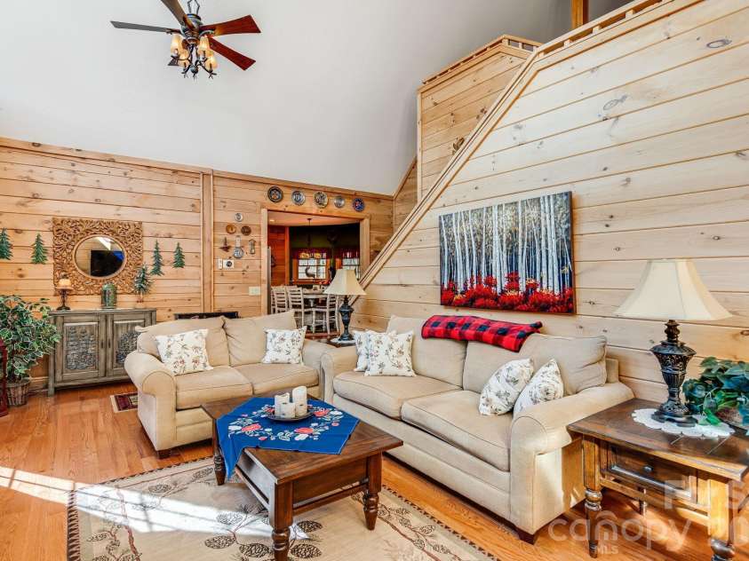 158 Raven Boulevard, Lake Lure, NC 28746.  MLS# CAR4335082, YatesRealty ID 4906. Enter into a open floor plan with soaring ceilings 