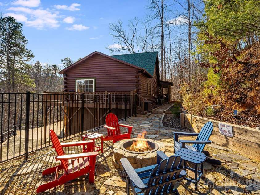 158 Raven Boulevard, Lake Lure, NC 28746.  MLS# CAR4335082, YatesRealty ID 4906. Gather.
