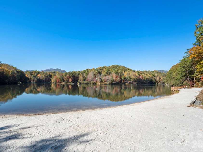158 Raven Boulevard, Lake Lure, NC 28746.  MLS# CAR4335082, YatesRealty ID 4906. Lake in the fall