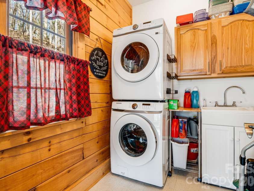 158 Raven Boulevard, Lake Lure, NC 28746.  MLS# CAR4335082, YatesRealty ID 4906. Laundry room off kitchen area 